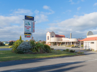 The Village Inn sign